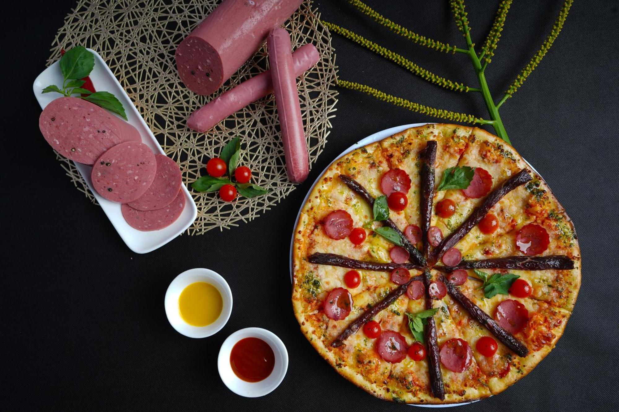 Sataya Resort Marsa Alam Exterior photo A pizza with salami