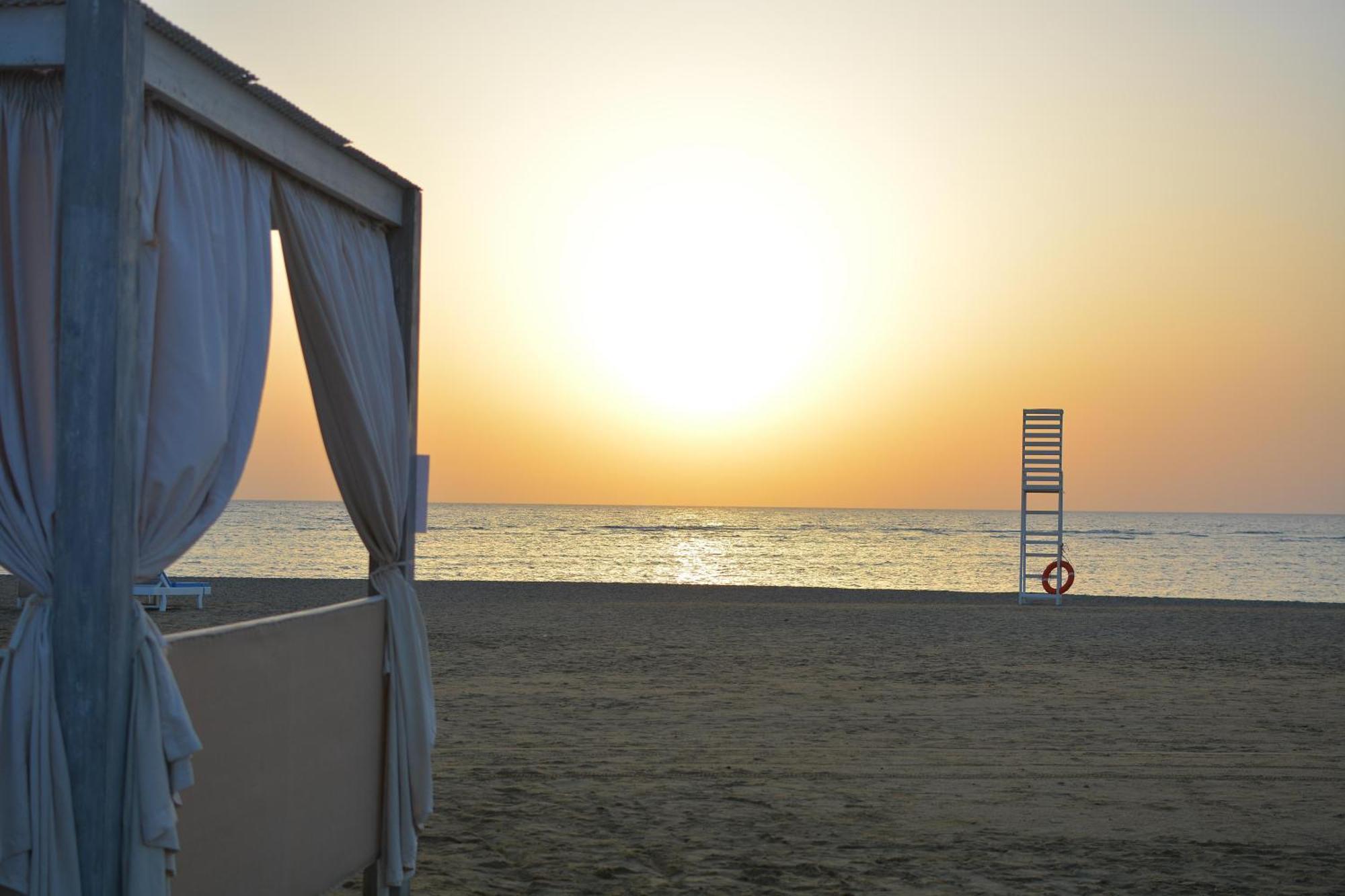 Sataya Resort Marsa Alam Exterior photo Sunset at the beach